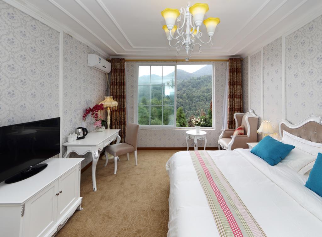 Panshan Tingquan Tuwo Holiday Resort Лэшань Номер фото