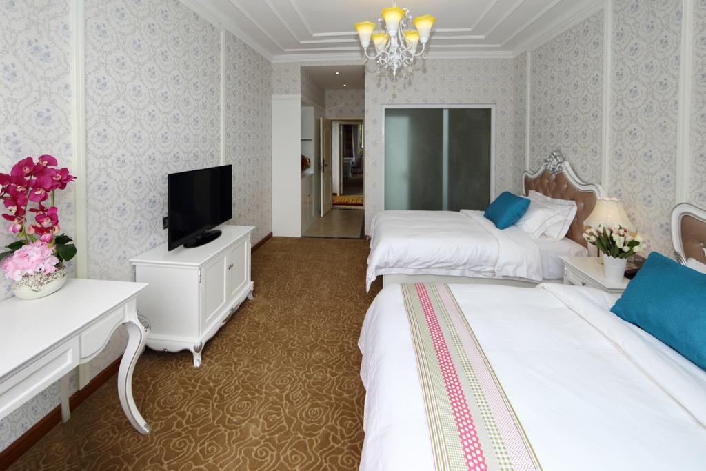 Panshan Tingquan Tuwo Holiday Resort Лэшань Номер фото