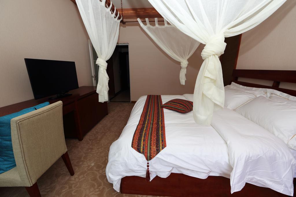 Panshan Tingquan Tuwo Holiday Resort Лэшань Номер фото