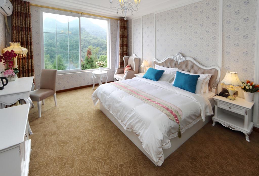 Panshan Tingquan Tuwo Holiday Resort Лэшань Номер фото