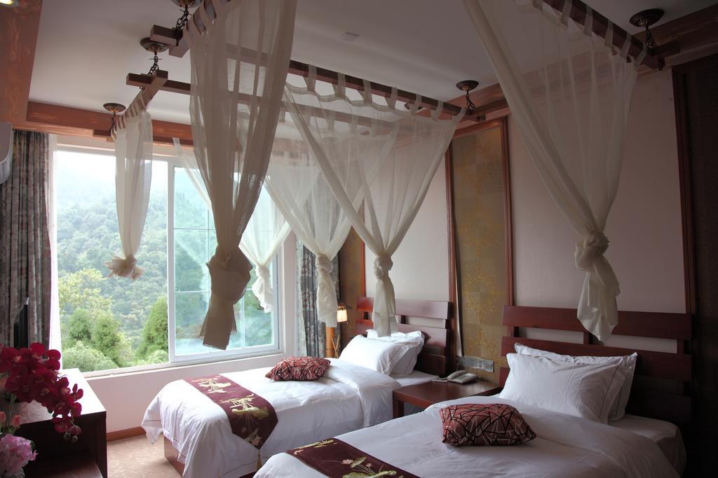 Panshan Tingquan Tuwo Holiday Resort Лэшань Номер фото