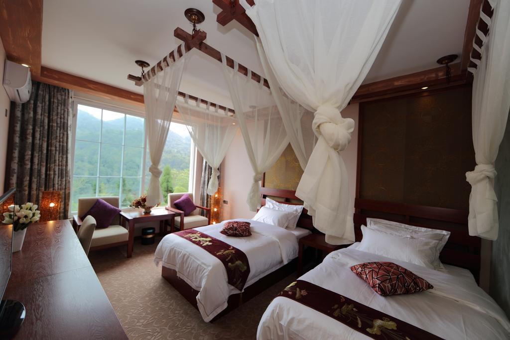Panshan Tingquan Tuwo Holiday Resort Лэшань Номер фото